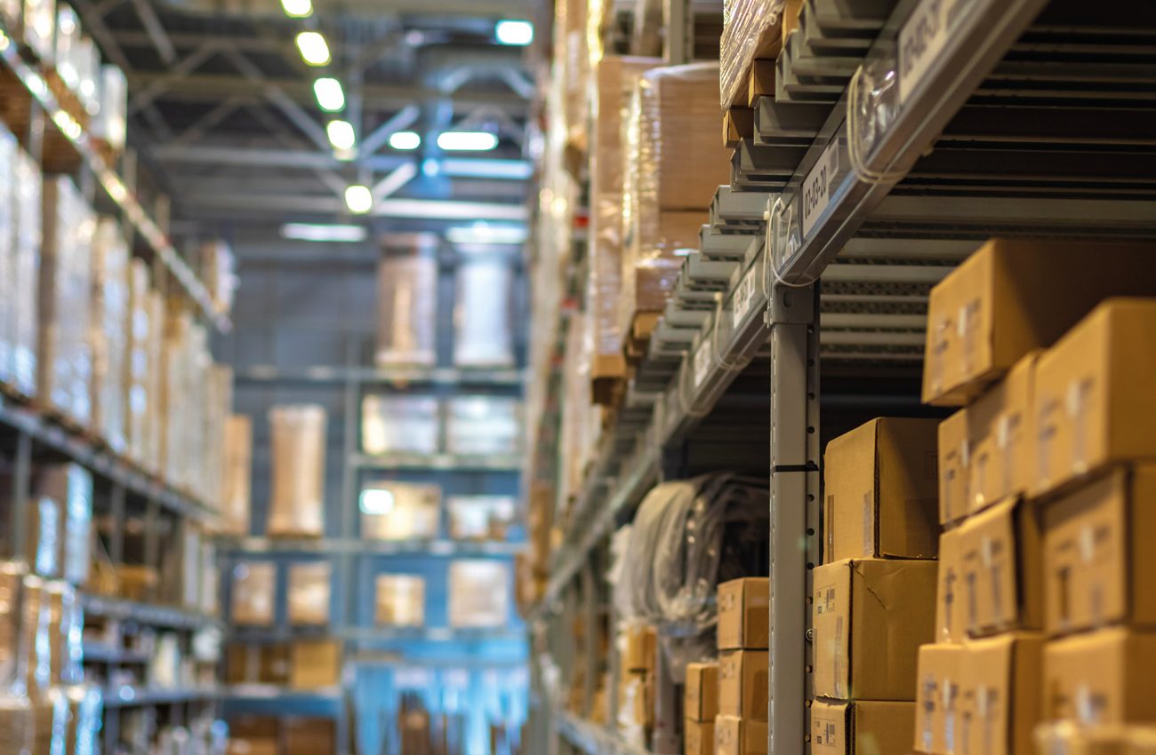 Modern warehouse with goods on shelves / focus with shallow depth of field