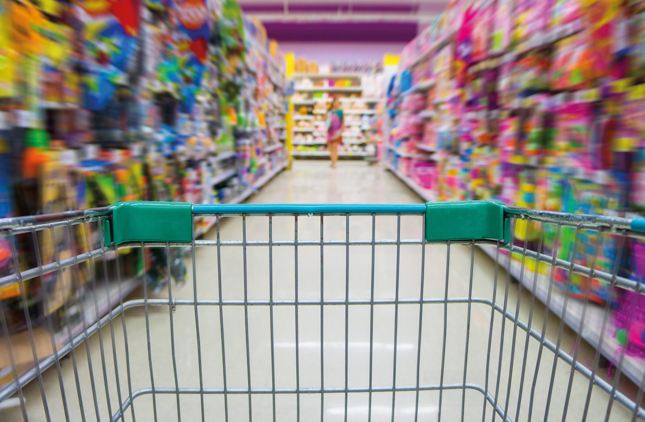 Shopping cart in toys department store