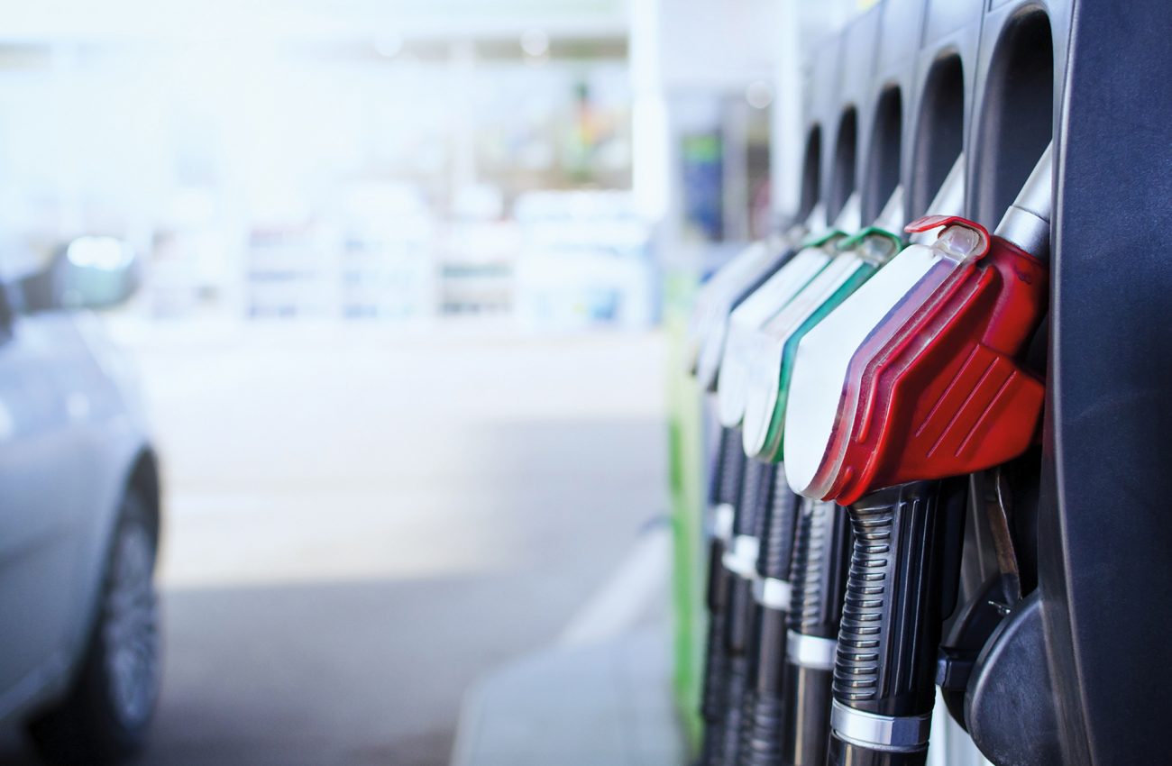 Gas station. Fuel dispenser and car ready to be filled up at pet